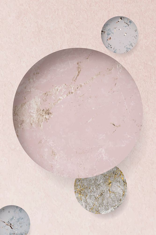 Round patterned on pink marble textured background vector