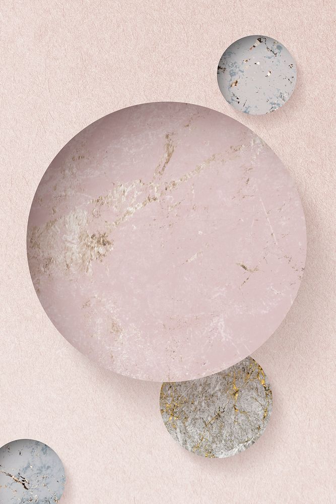 Round patterned on pink marble textured background illustration
