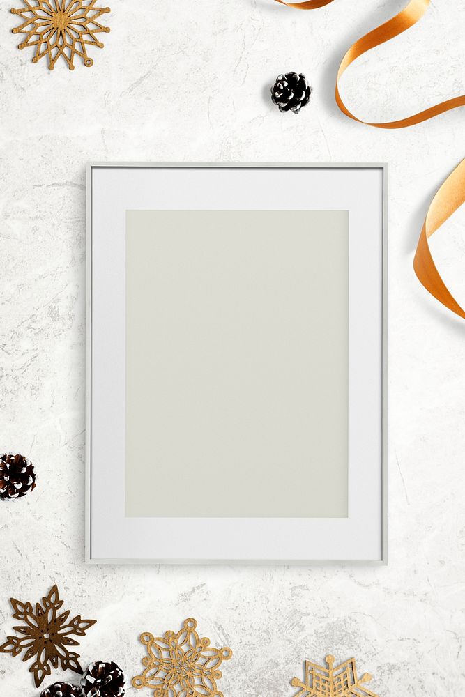 Silver frame mockup with Christmas decorations