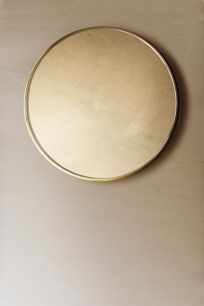 Gold framed mirror on a brown wall mockup