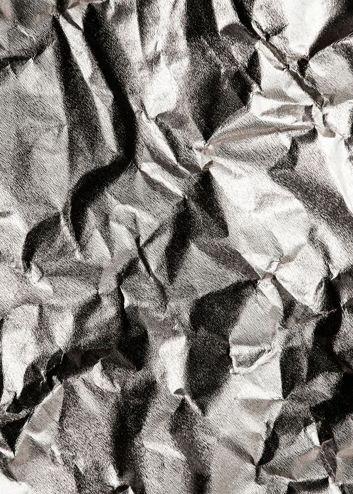 Silver scrunched paper textured background