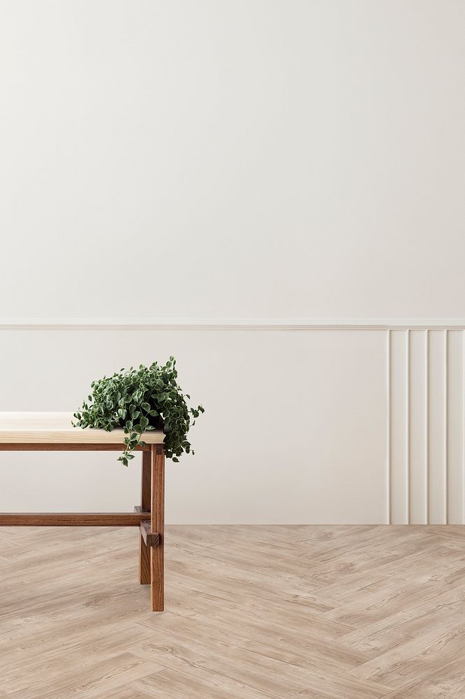 Plant on a wooden table in living room mockup