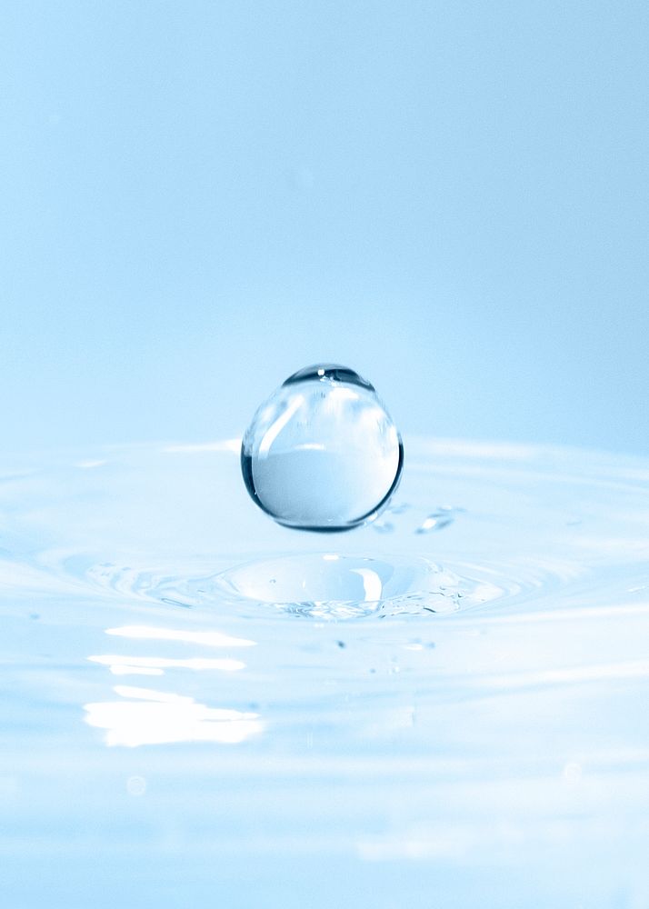 Water drop on clean water abstract background 