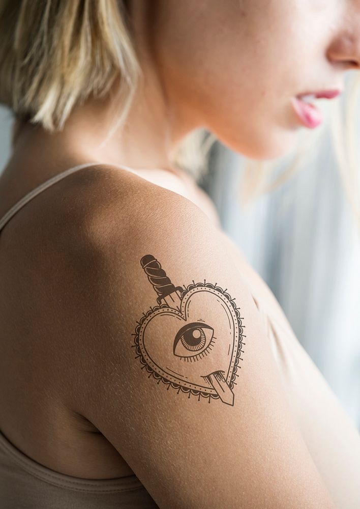 Demon heart  tattoo design psd mockup on a woman&rsquo;s arm