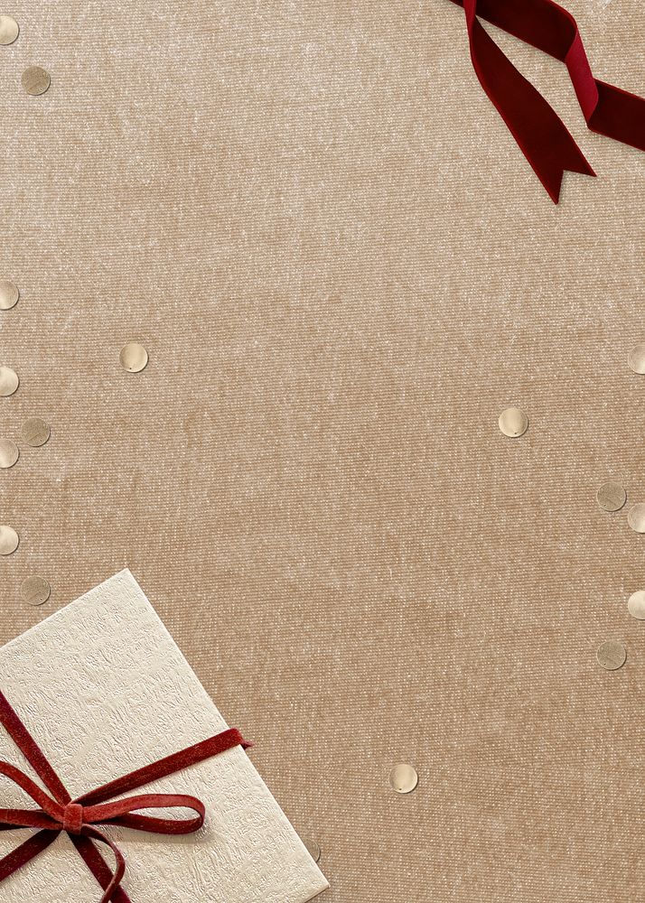 Christmas gift psd with confetti on beige background