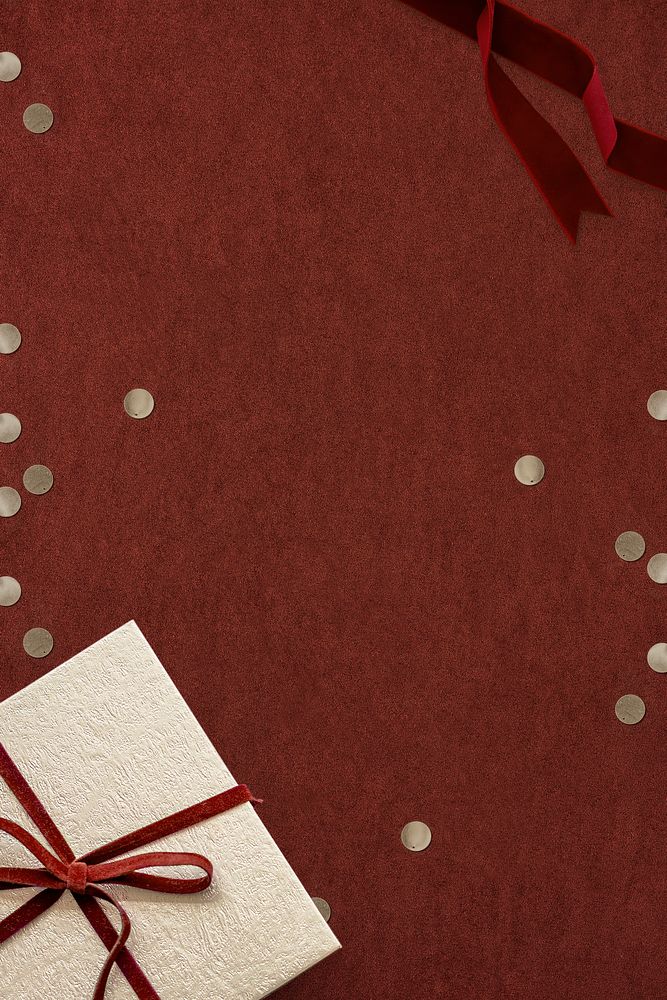 Christmas gift psd with confetti on red background
