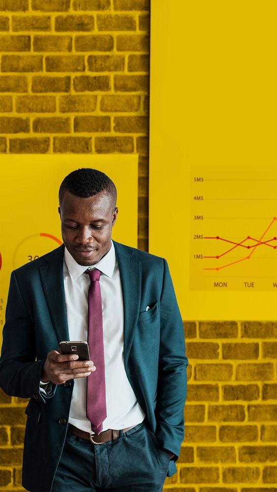 Young black businessman on phone over infographic background