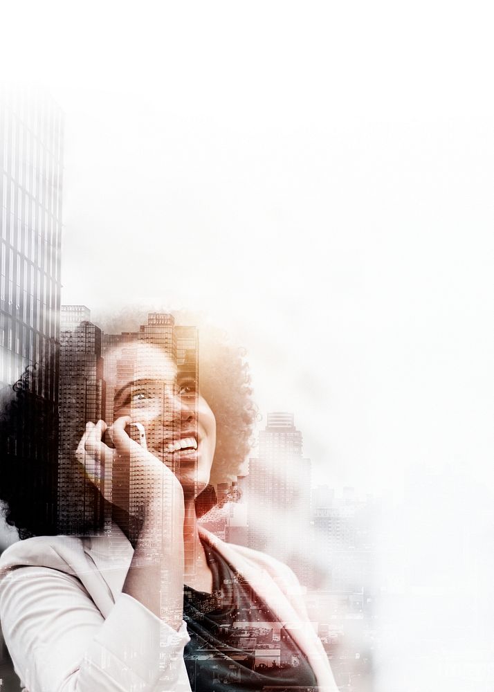 Young business woman on phone over city background