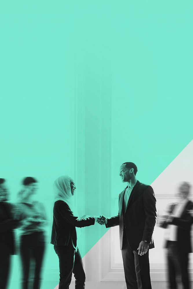 Hijab businesswoman shaking hands green background