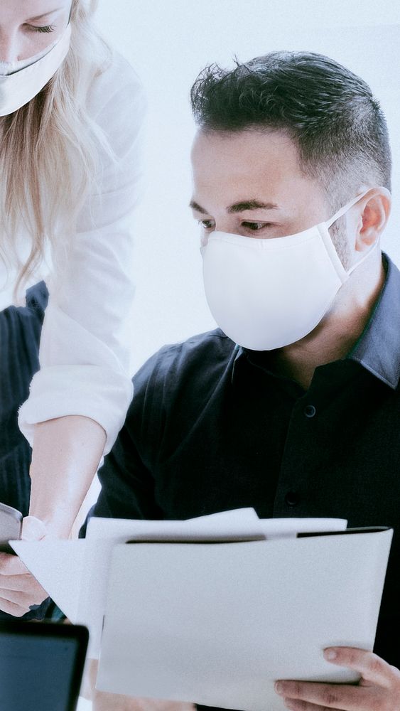 Business team wearing face masks during coronavirus pandemic