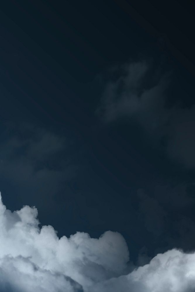 Dark blue sky background with clouds