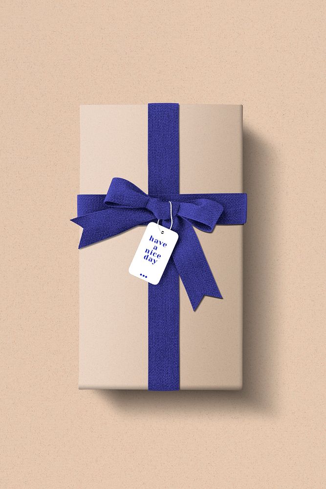 Birthday gift box with blue ribbons