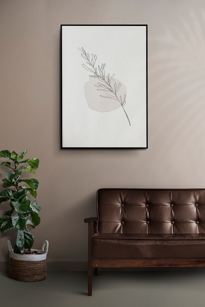 Picture frame sofa mockup psd on the living room wall