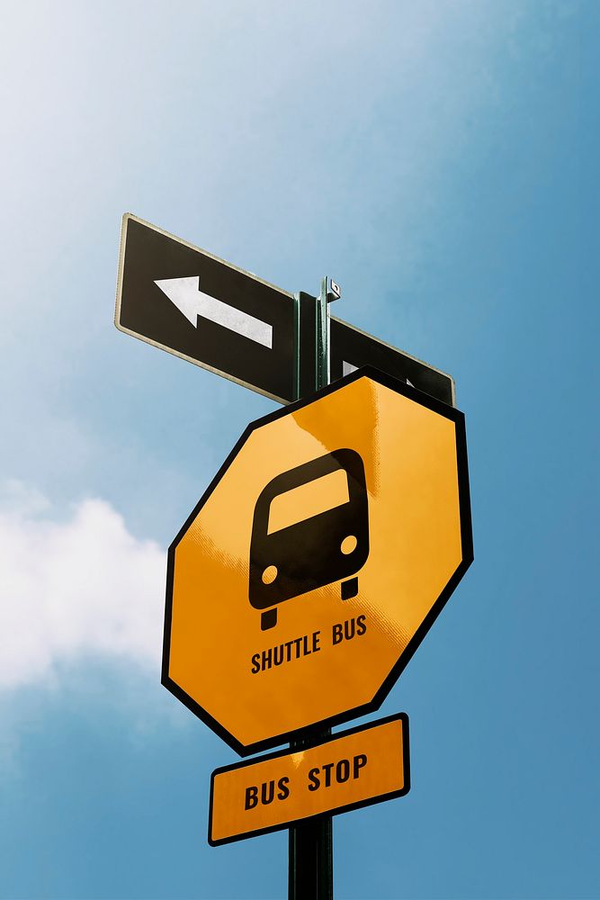 Street signs on blue sky background