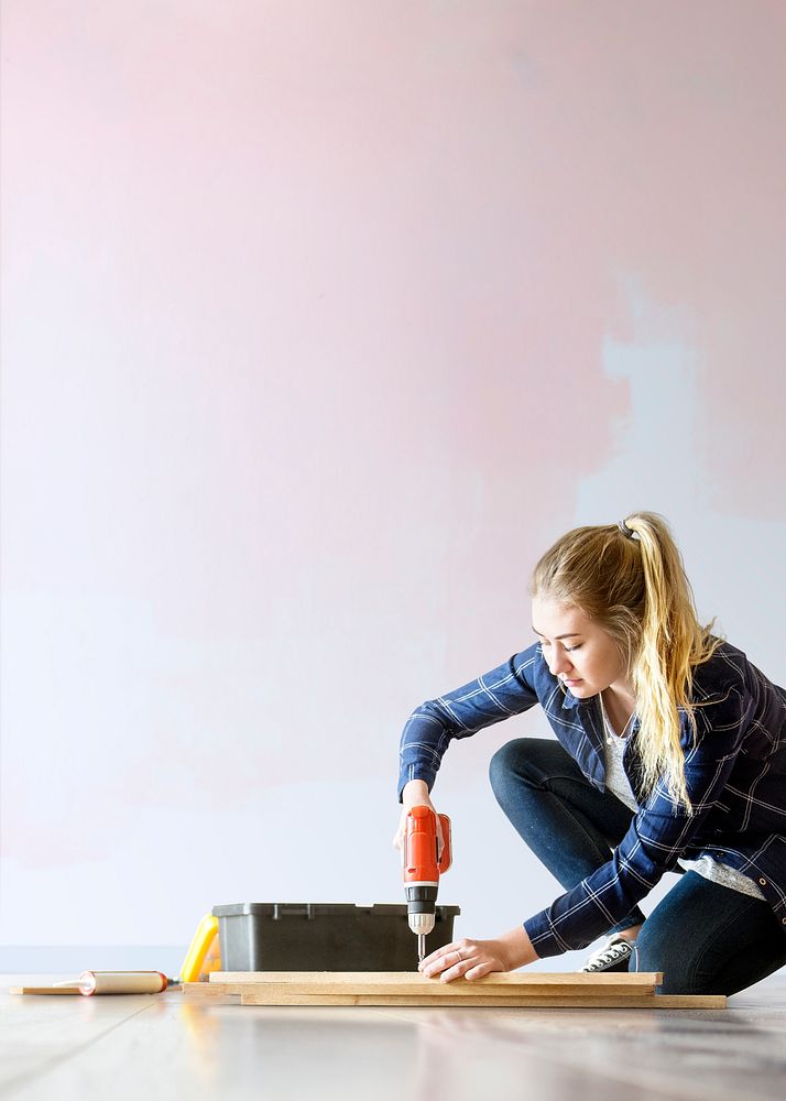 Wall mockup psd with woman renovating the house