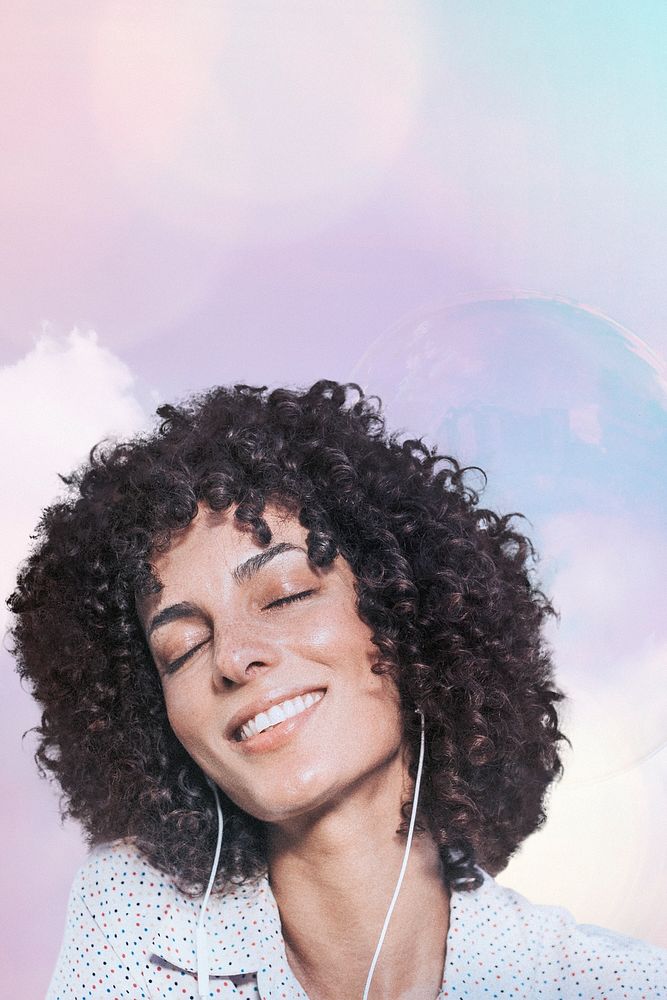 Happy woman with curly hair wearing earphones remixed media with pastel bokeh lights effect