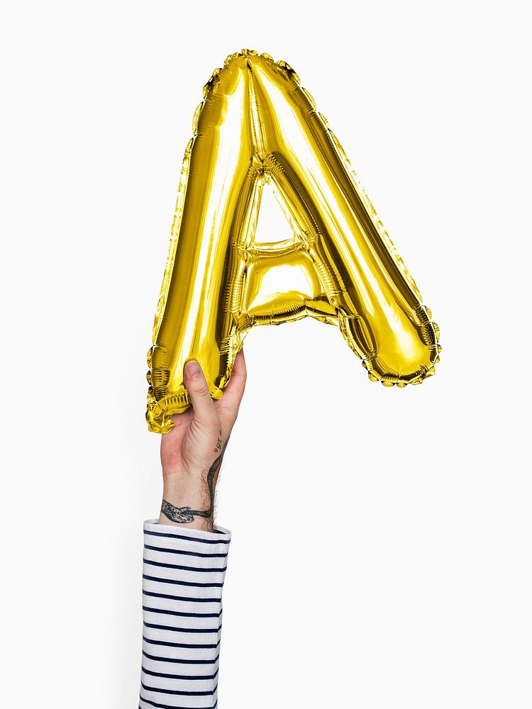 Hand holding capital letter A balloon