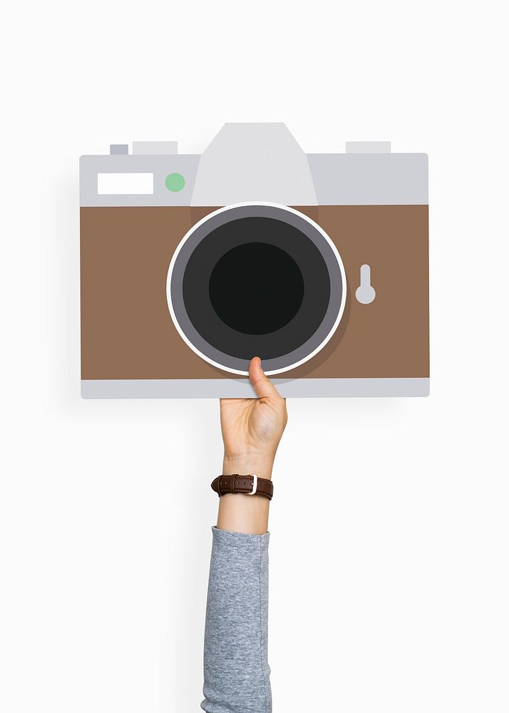 Hand holding a camera cardboard prop