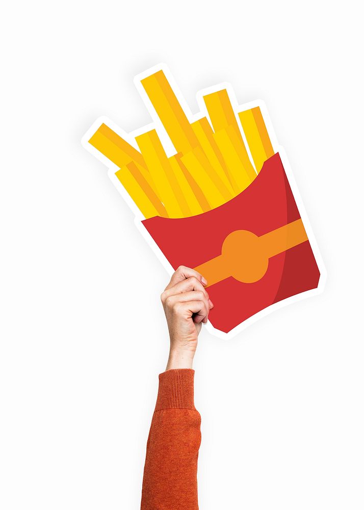 Hand holding a french fries cardboard prop
