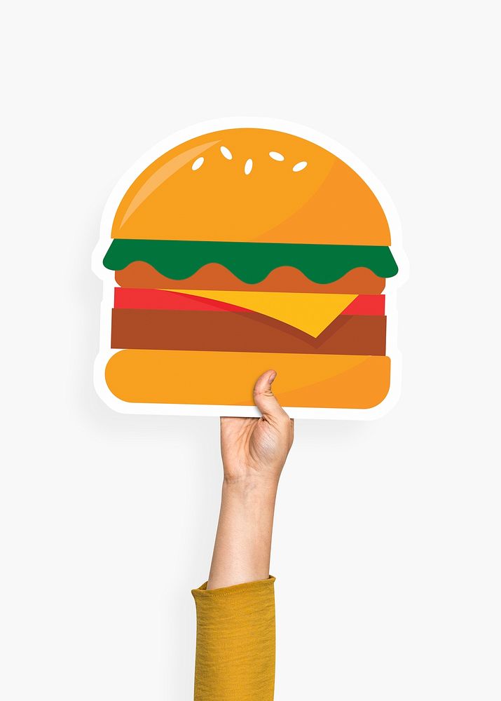 Hand holding a burger cardboard prop
