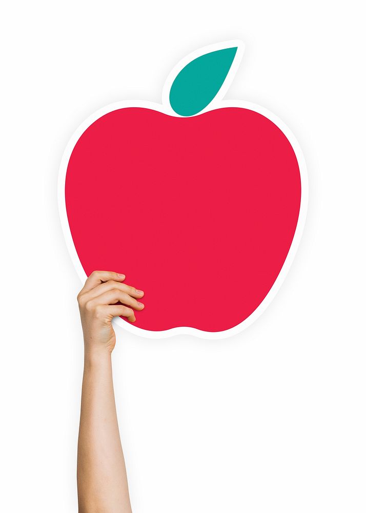 Hand holding an apple cardboard prop