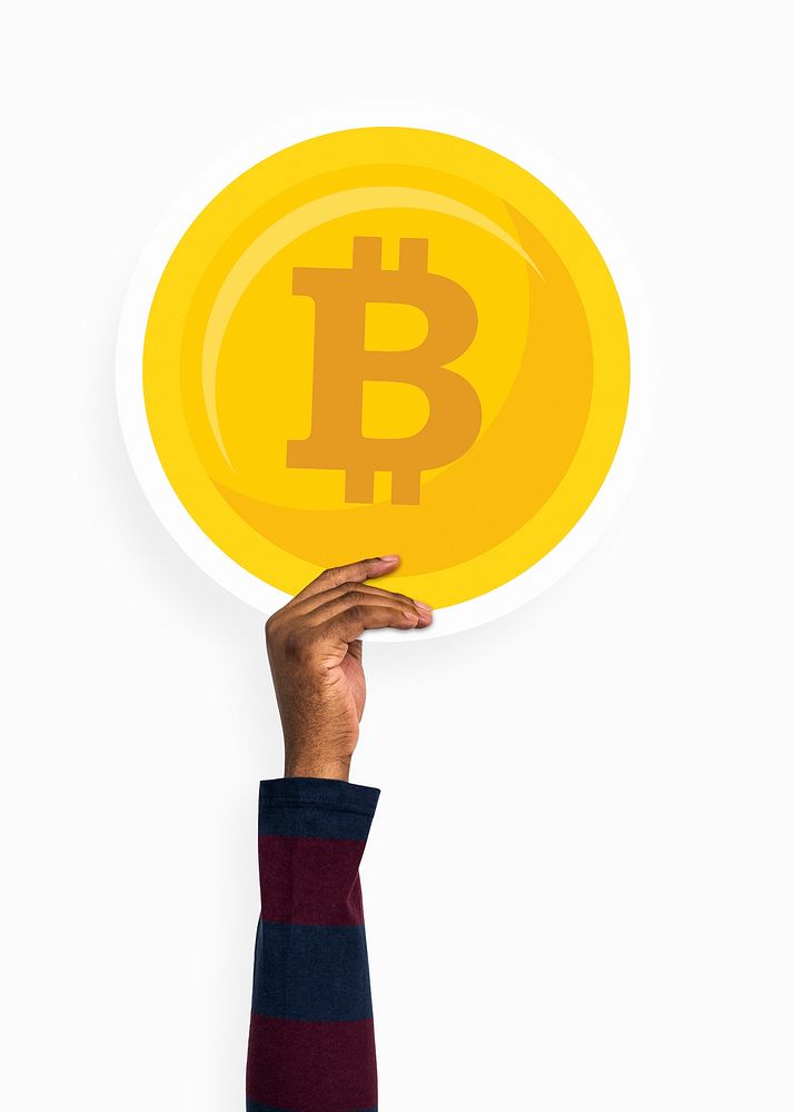 Hand holding a bitcoin cardboard prop
