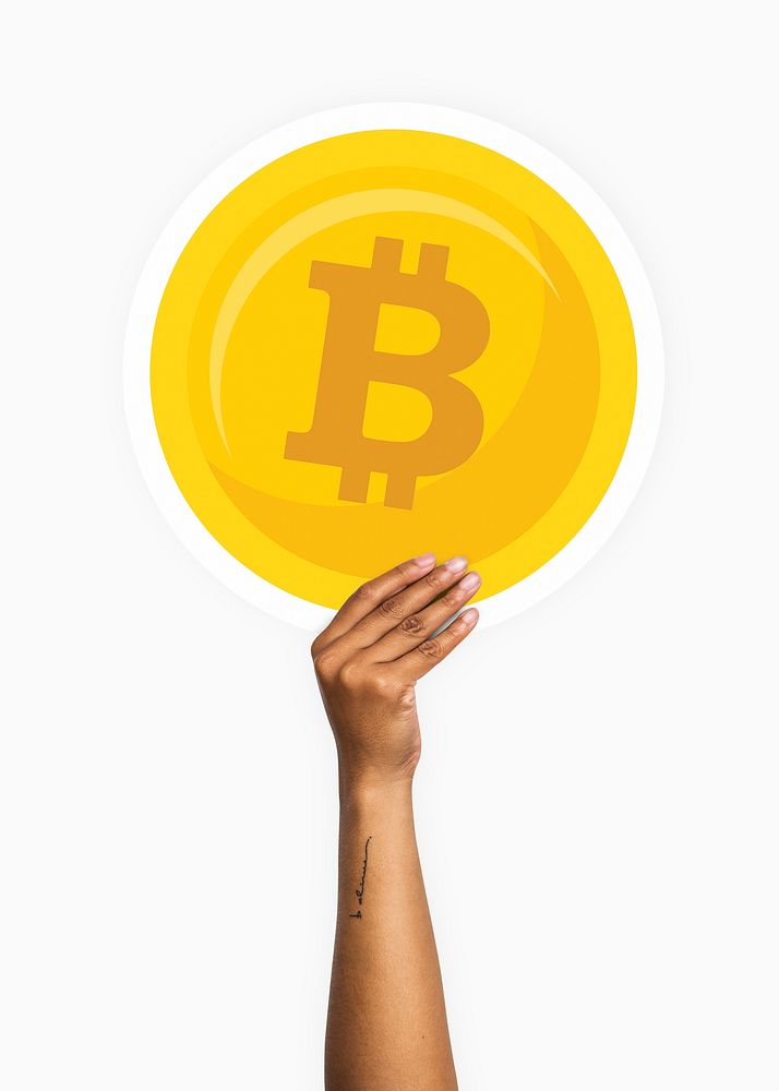 Hand holding a bitcoin cardboard prop