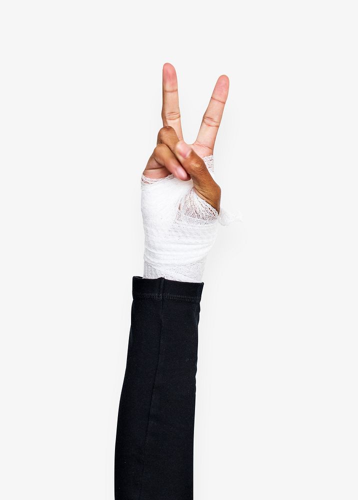 Hand gesturing peace with fingers