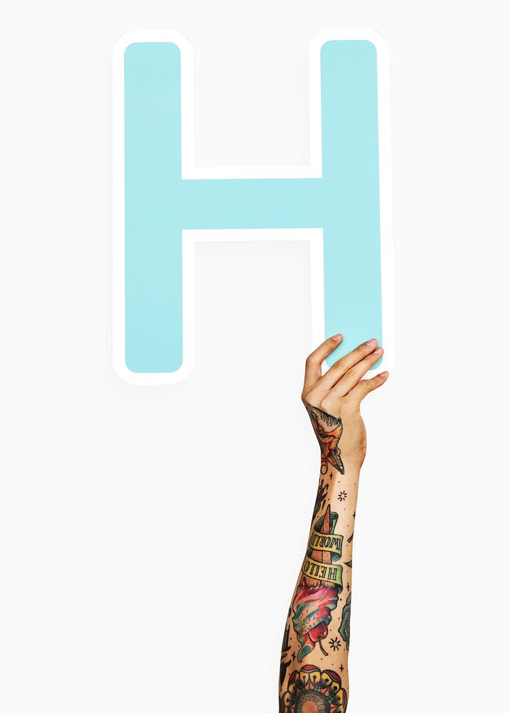 Hands holding the letter H