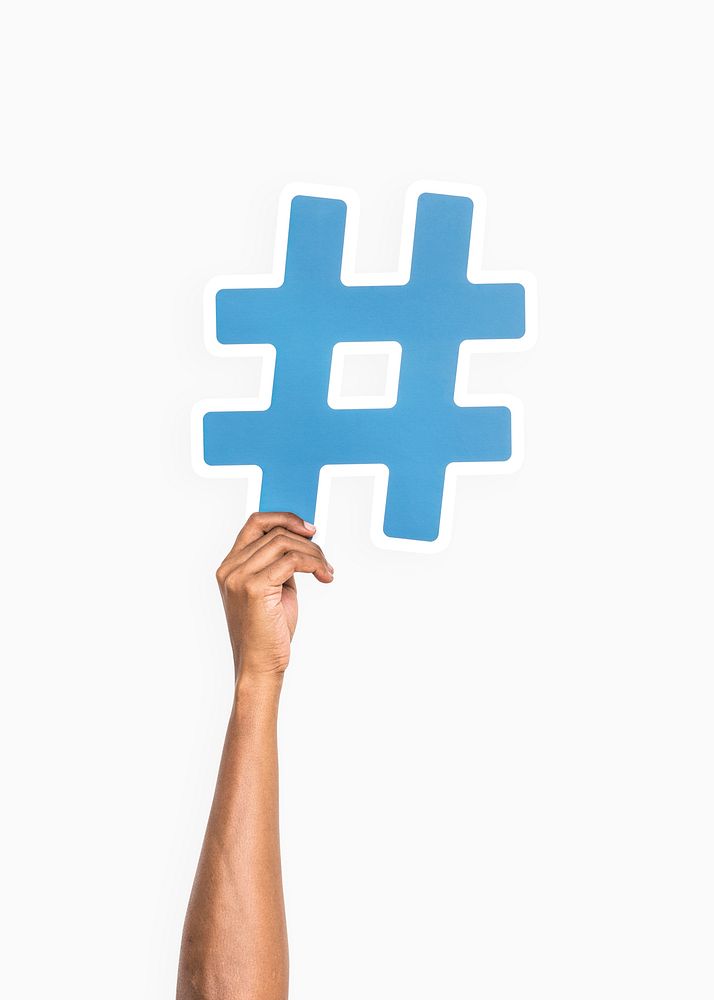 Hands holding a hashtag icon