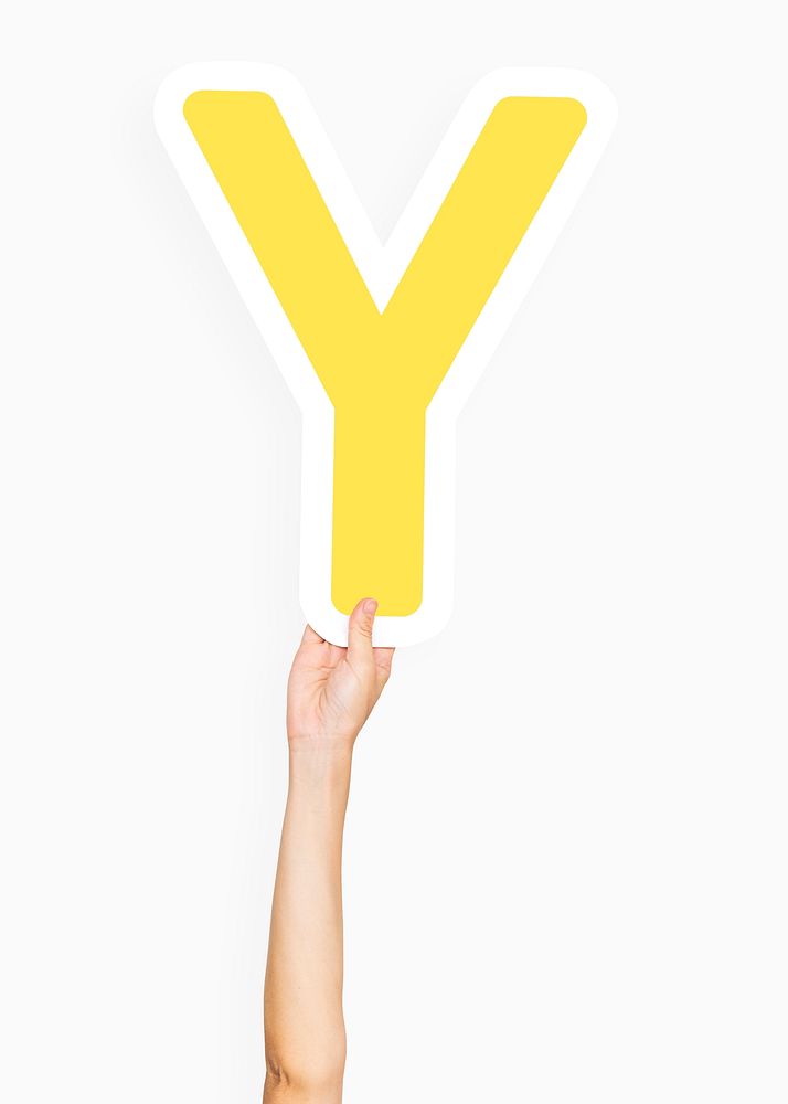 Hand holding letter Y sign