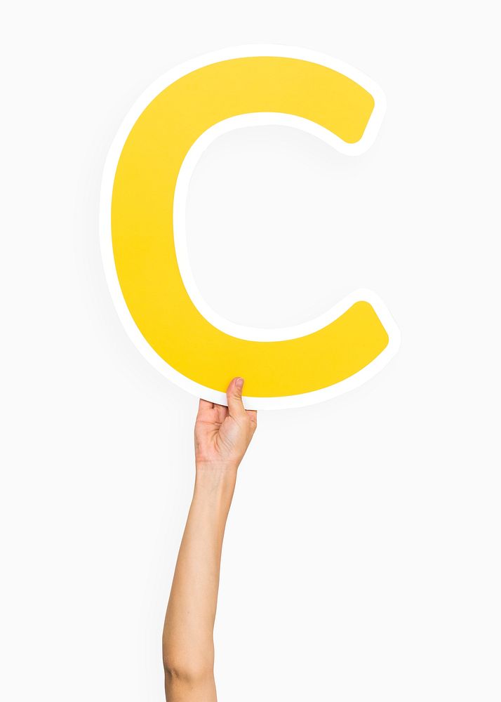 Hands holding the letter C