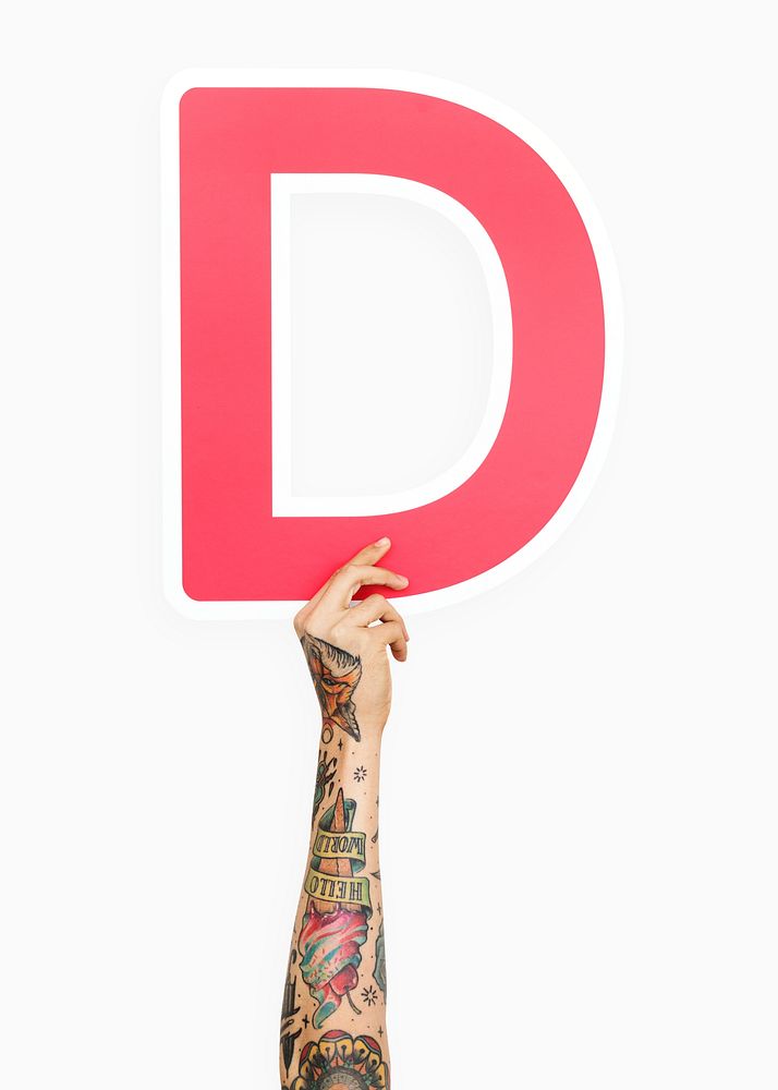 Hand holding the letter D