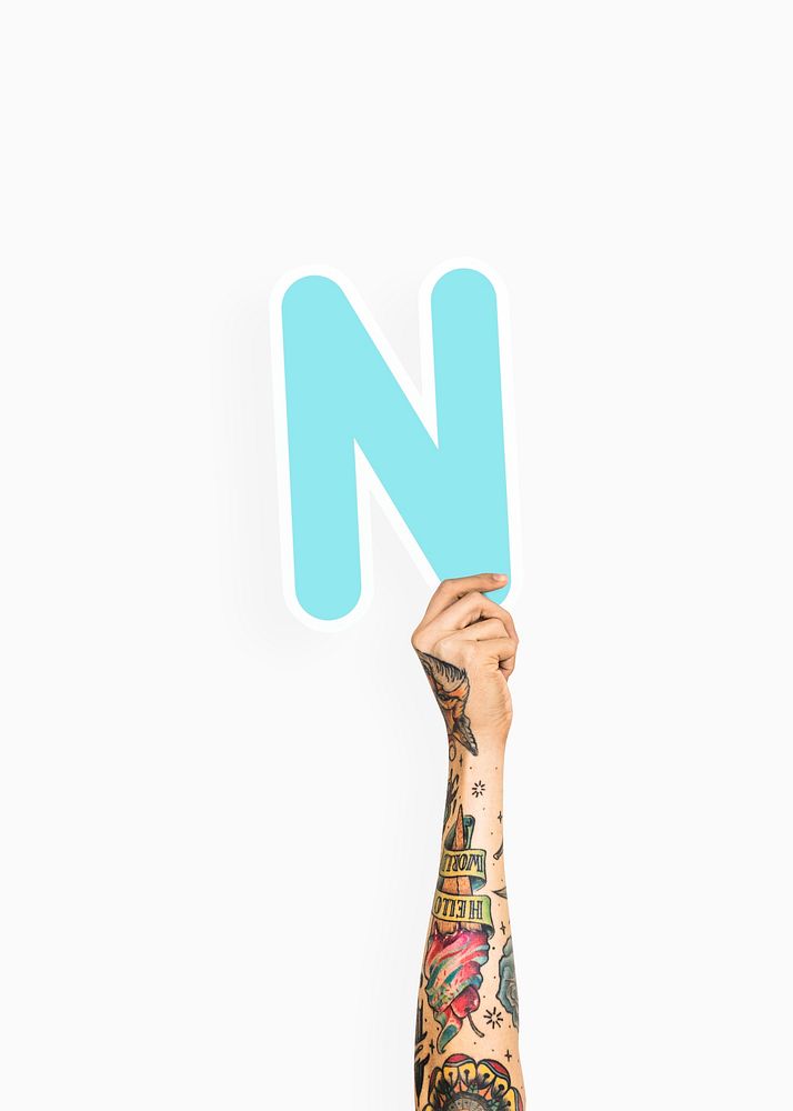 Hand holding letter N sign