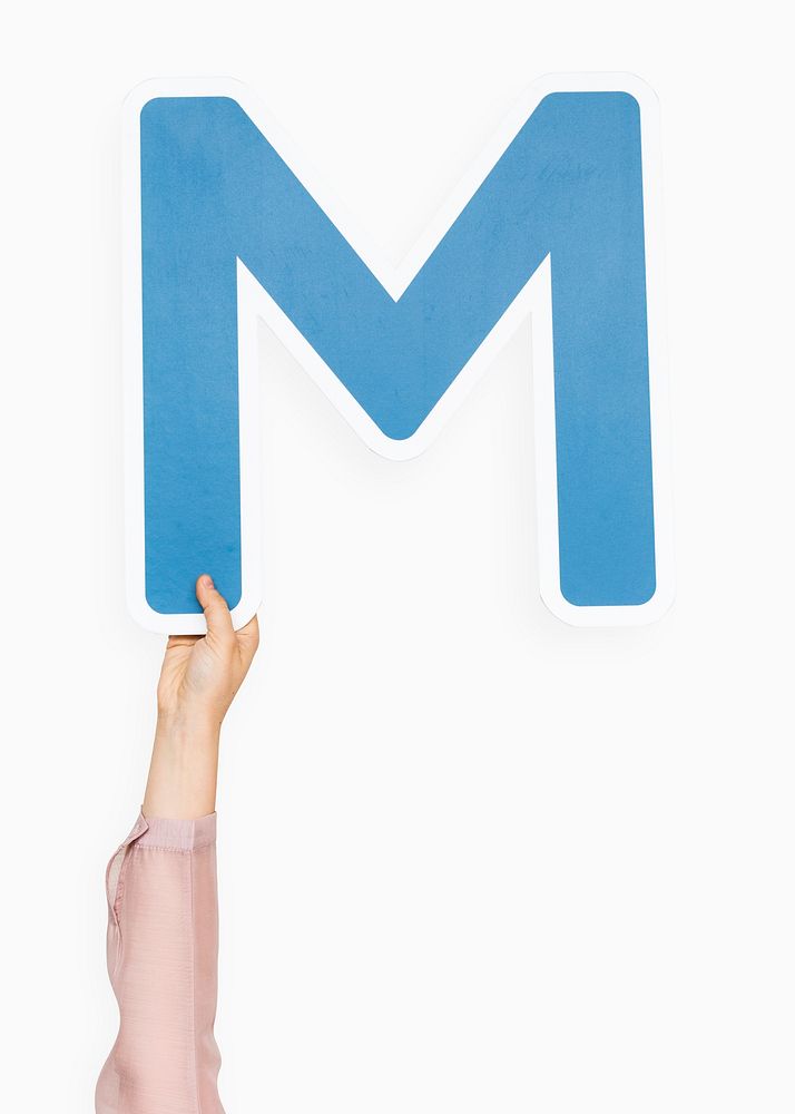 Hand holding letter M sign