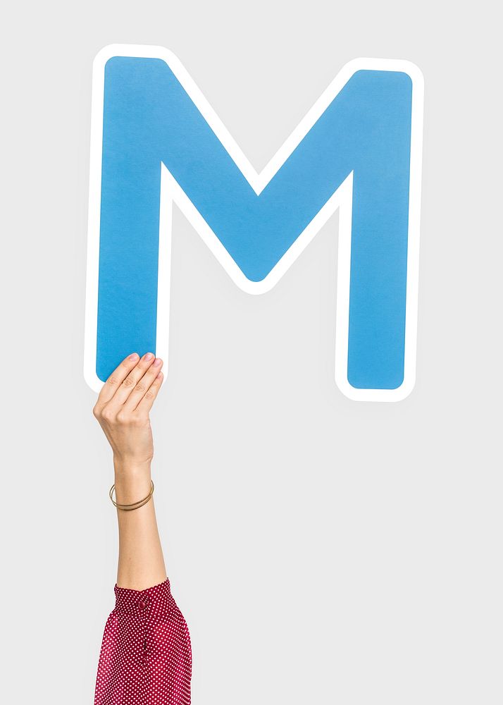 Hand holding letter M sign