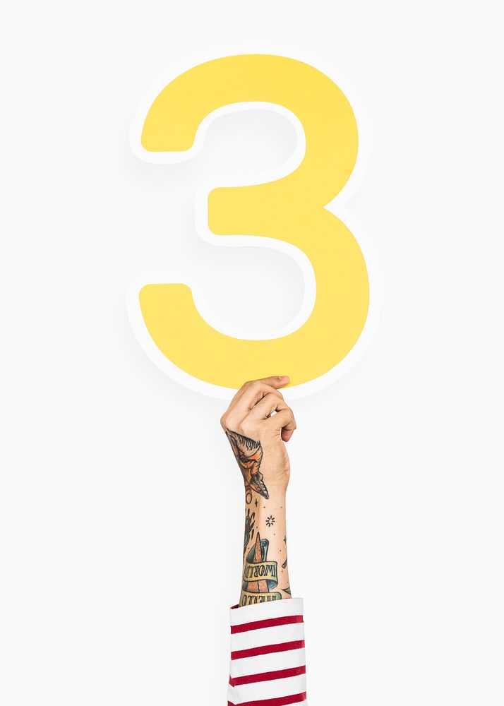Hand holding number three sign