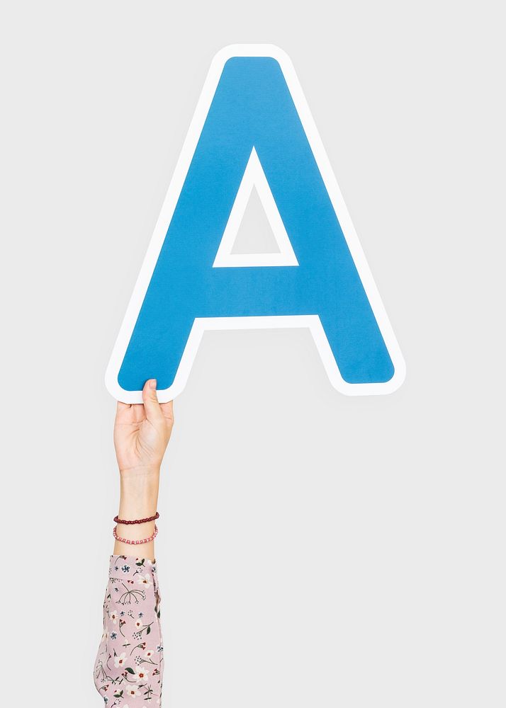 Hand holding the letter A