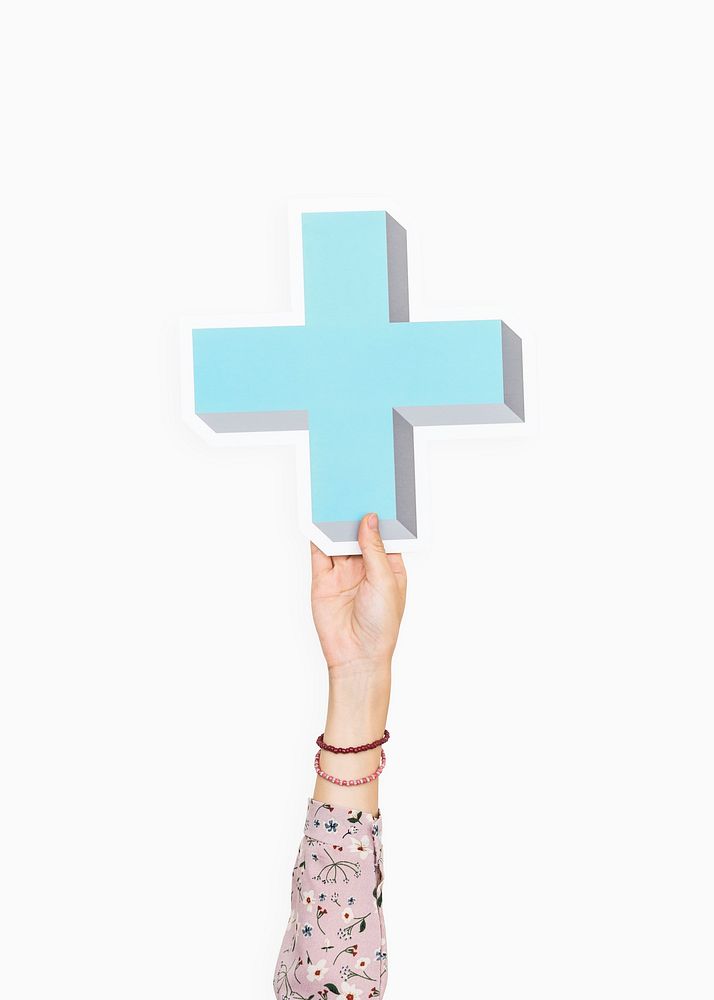 Arm raised and holding blue cross icon