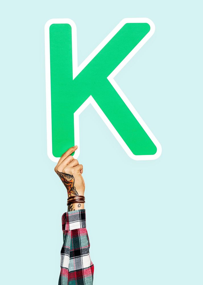 Hand holding letter K sign