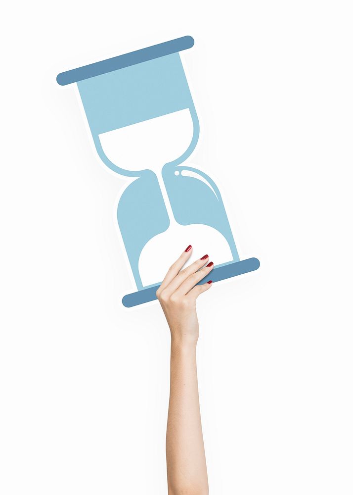 Hand holding an hourglass clipart