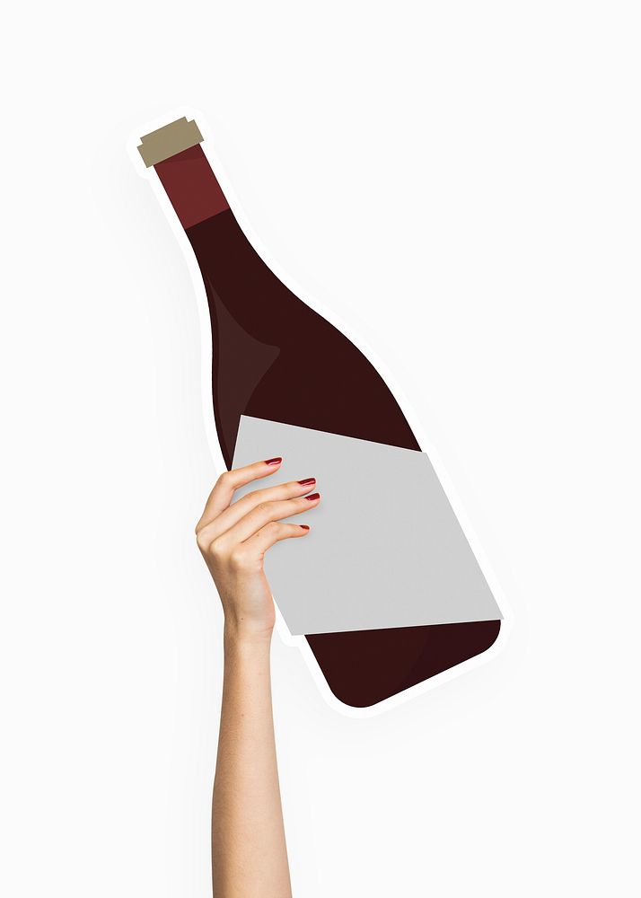 Hand holding a red wine bottle