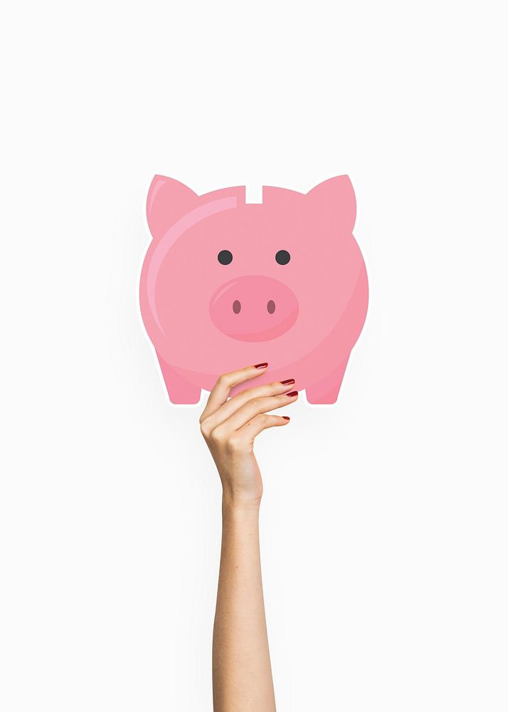 Hand holding a piggy bank clipart