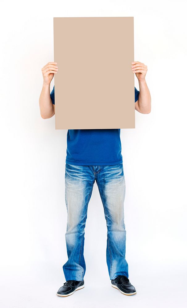 Man holding a blank brown board