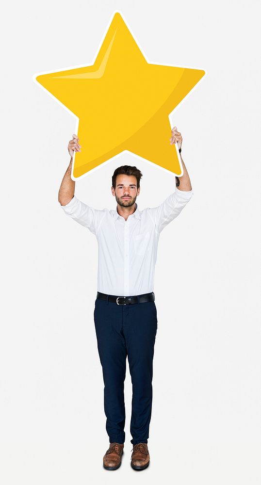 Businessman showing golden star rating symbol