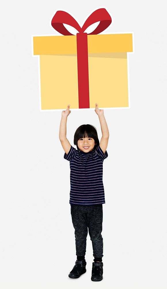 Happy boy holding a gift box