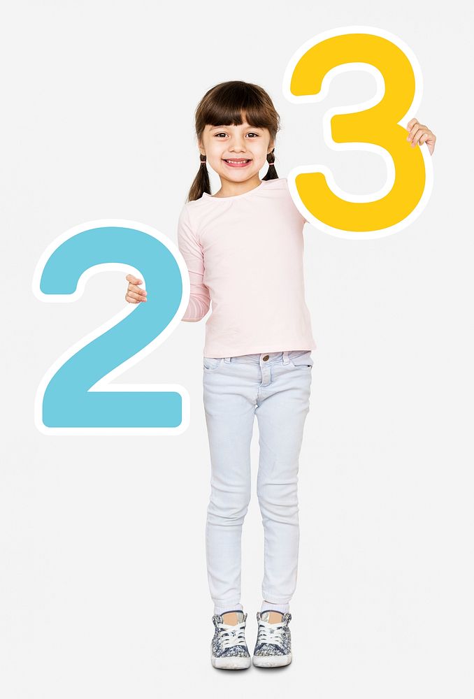 Cheerful girl holding number two and three