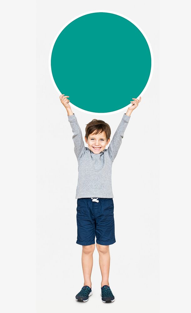 Happy kid holding an empty round board