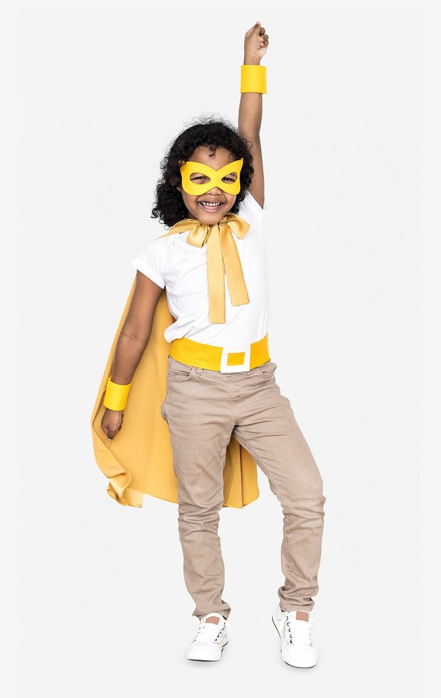 Cheerful kid in a superhero costume
