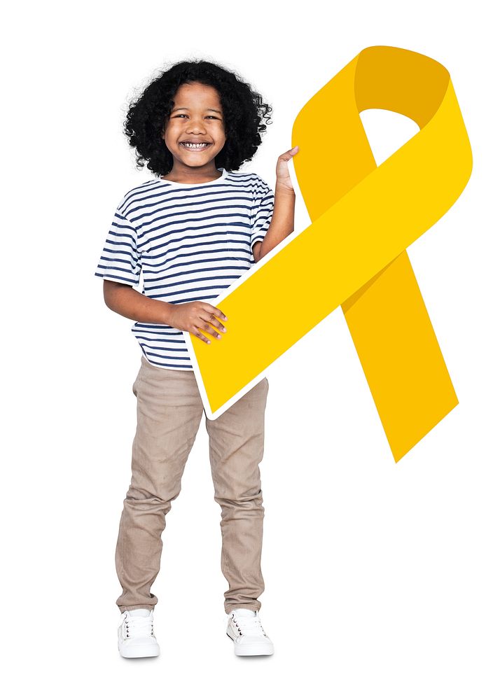Young boy holding gold ribbon supporting childhood cancer awareness